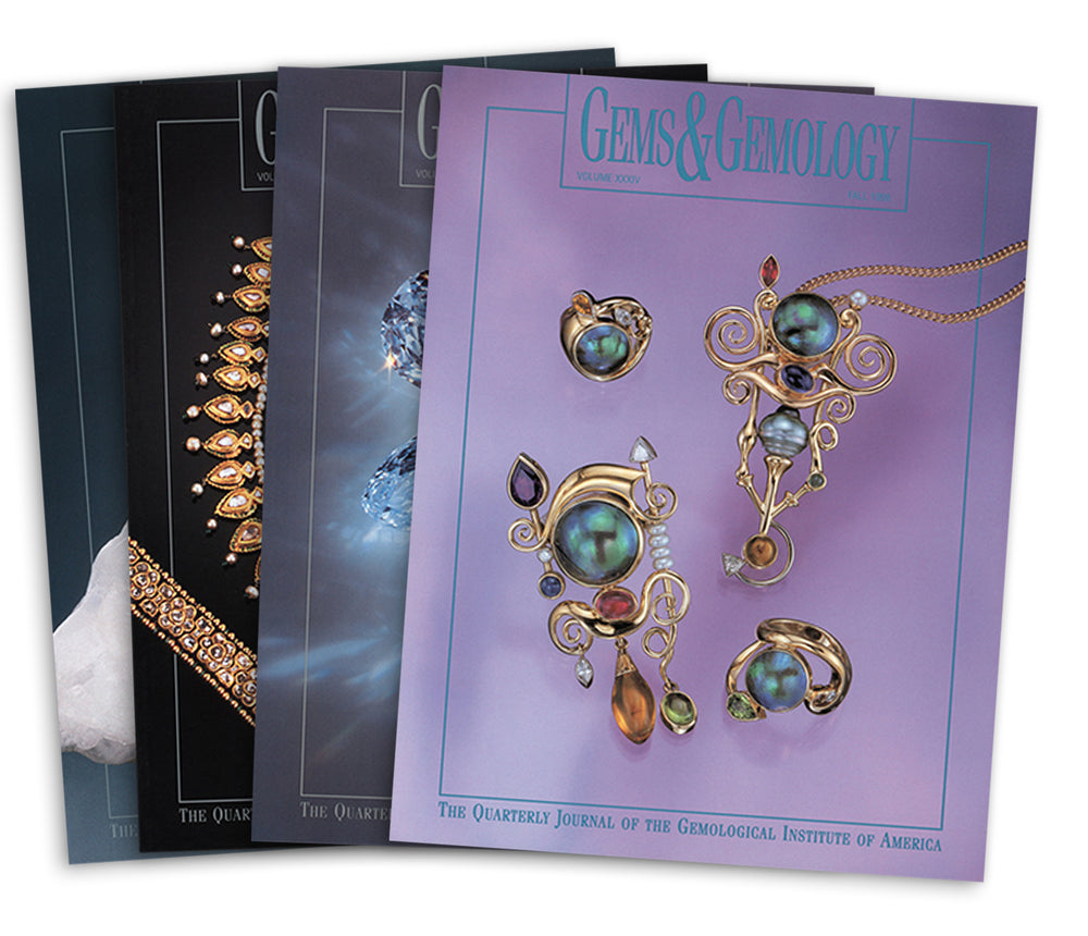 Stack of 4 1998 Gems & Gemology issues; top issue features whimsical pieces of artwork with jewels