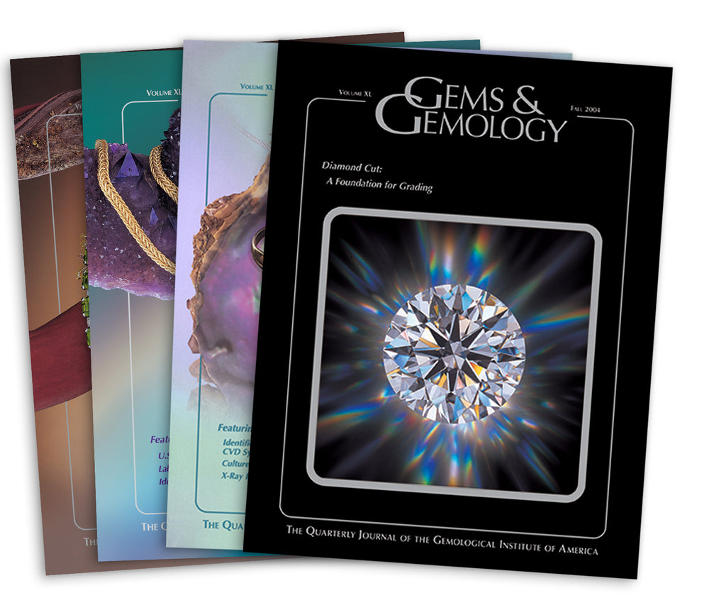 Stack of 4 2004 Gems & Gemology issues; top issue features gleaming diamond
