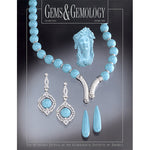 Cover of Gems & Gemology Spring 1999 issue, featuring pale blue stone carved as jewelry and sculpture