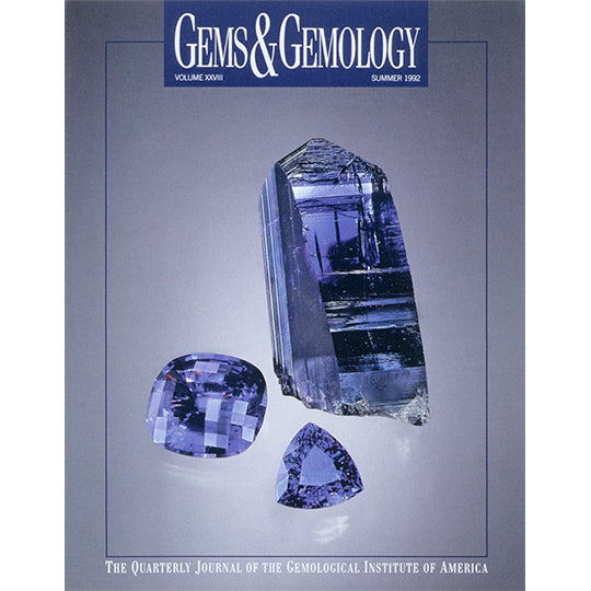 Cover of Gems & Gemology Summer 1992 issue, featuring translucent blue rough and polished gemstone