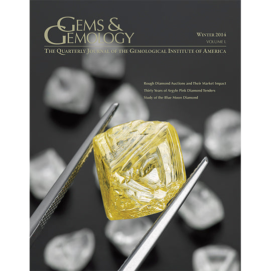 Cover of Gems & Gemology Winter 2014 issue, featuring yellow gemstone held with tweezers