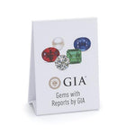White cardboard stand-up display with images of gems, logo, and heading "Gems with Reports by GIA" 