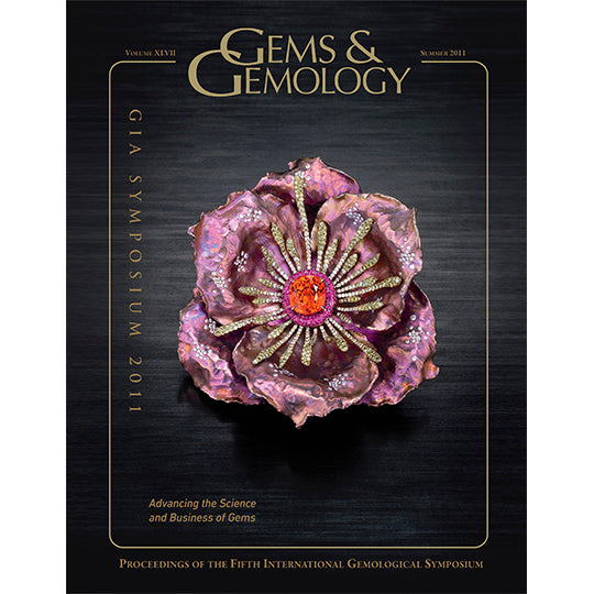 Cover of Gems & Gemology Summer 2011 issue, featuring flower art object made of metals and gemstones