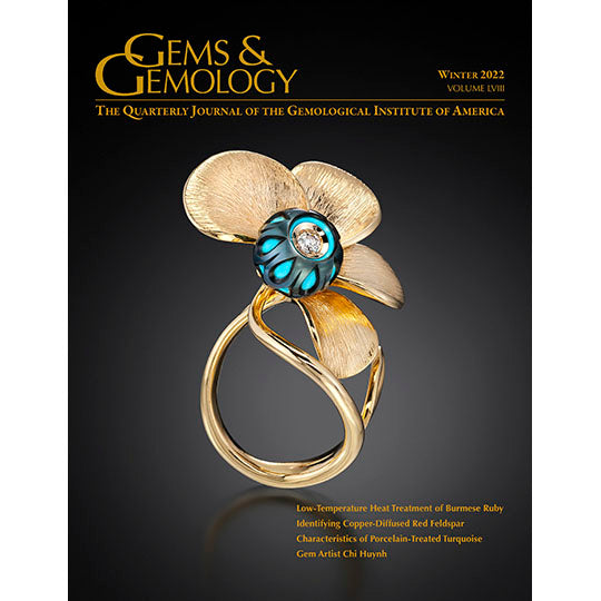 Cover of Gems & Gemology Winter 2022 issue, featuring the yellow gold “Sutol Ring” by gem artist Chi Huynh.