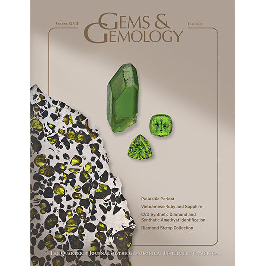 Cover of Gems & Gemology Fall 2011 issue, featuring green gems against tan background