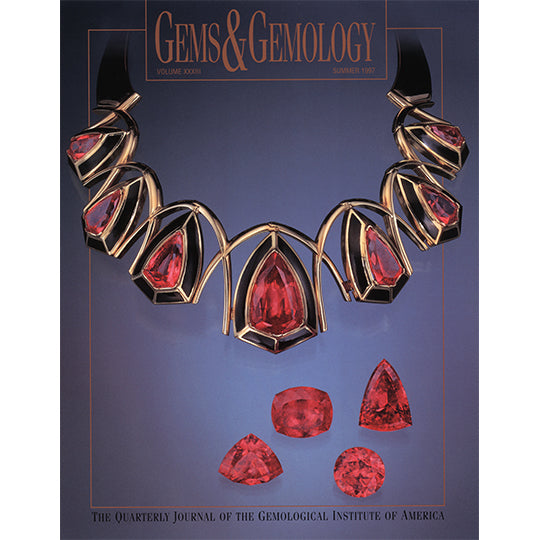 Cover of Gems & Gemology Summer 1997 issue, featuring gold choker with large red gemstones
