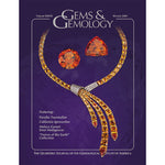 Gems & Gemology Winter 2001 issue, featuring orange gems and necklace against vibrant blue background