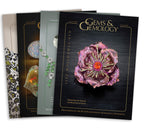 Stack of 4 2011 Gems & Gemology issues; top issue features flower artwork made from metal and gems