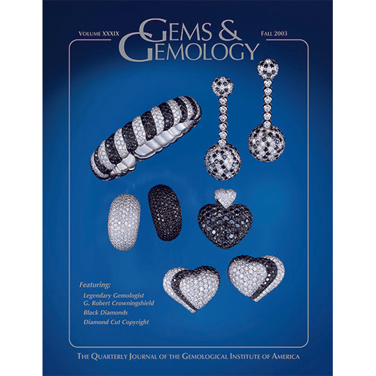 Cover of Gems & Gemology Fall 2003 issue, featuring objects encrusted with black and white jewels
