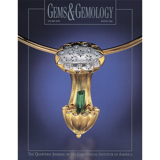 Cover of Winter 1999 Gems & Gemology issue, featuring golden art object holding cylindrical green gem