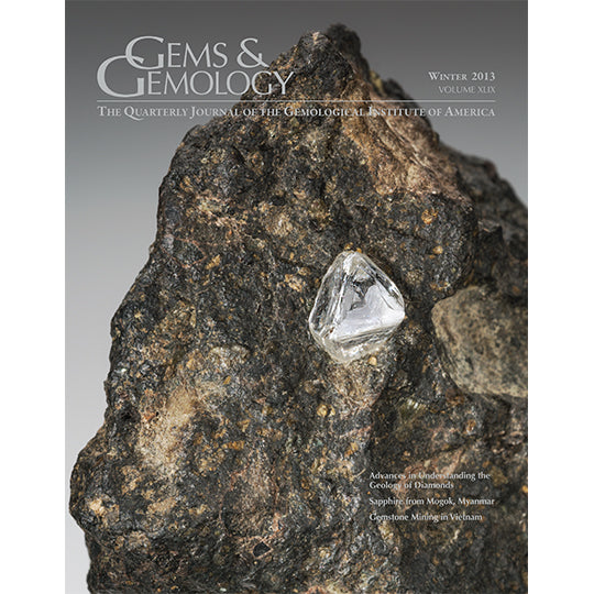 Cover of Gems & Gemology Winter 2013 issue, featuring diamond embedded in large stone