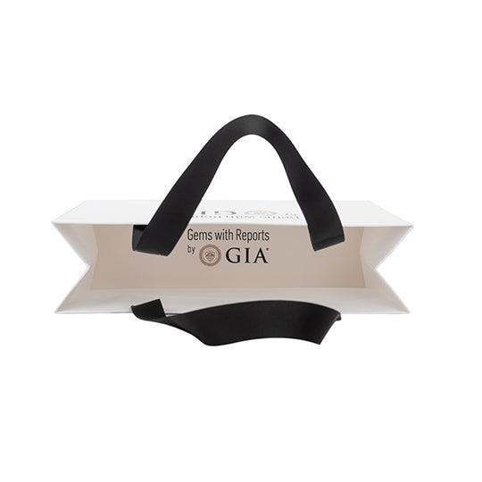 GIA shopping bag overhead view. Shopping bag interior shows text "Gems with Reports by GIA"