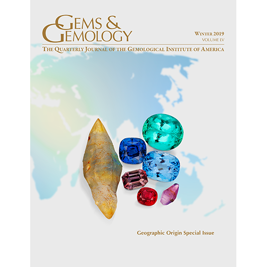 Cover of Gems & Gemology Winter 2019  issue, featuring colored gems against map of world