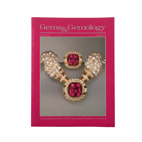 Cover of Gems & Gemology Winter 1998 issue, featuring jewelry made with gold, red gemstone, and pearl 